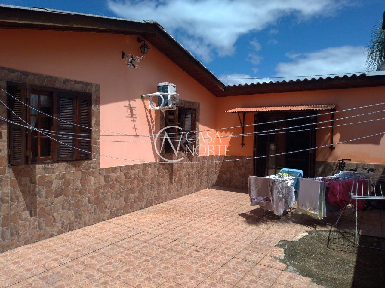 Casa à venda com 3 quartos, 120m², 3 vagas, Rua Santa Mônica no bairro Ponta Grossa em Porto Alegre