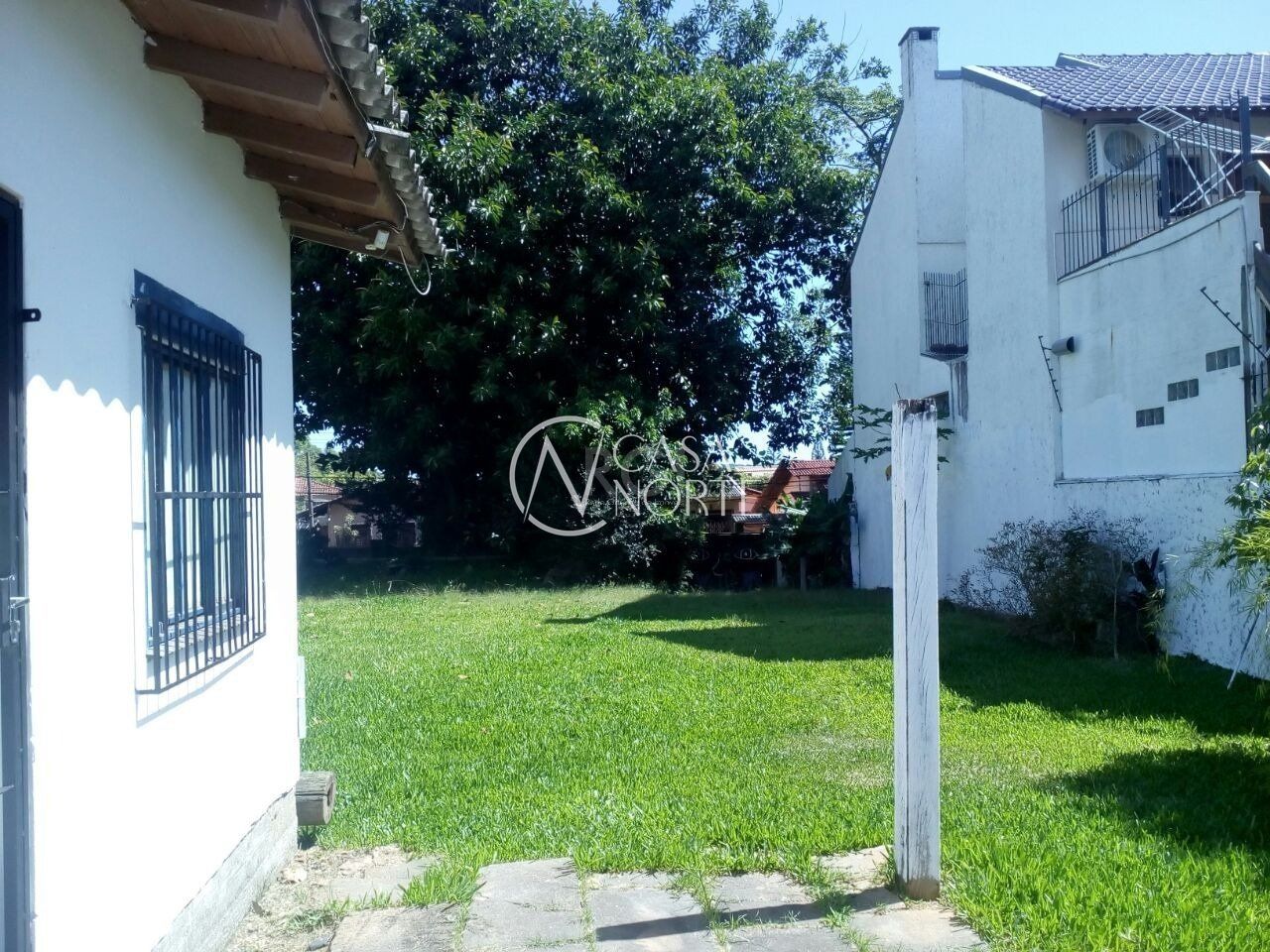 Casa à venda com 1 quarto, 51m², 2 vagas, Avenida Guarujá no bairro Guarujá em Porto Alegre