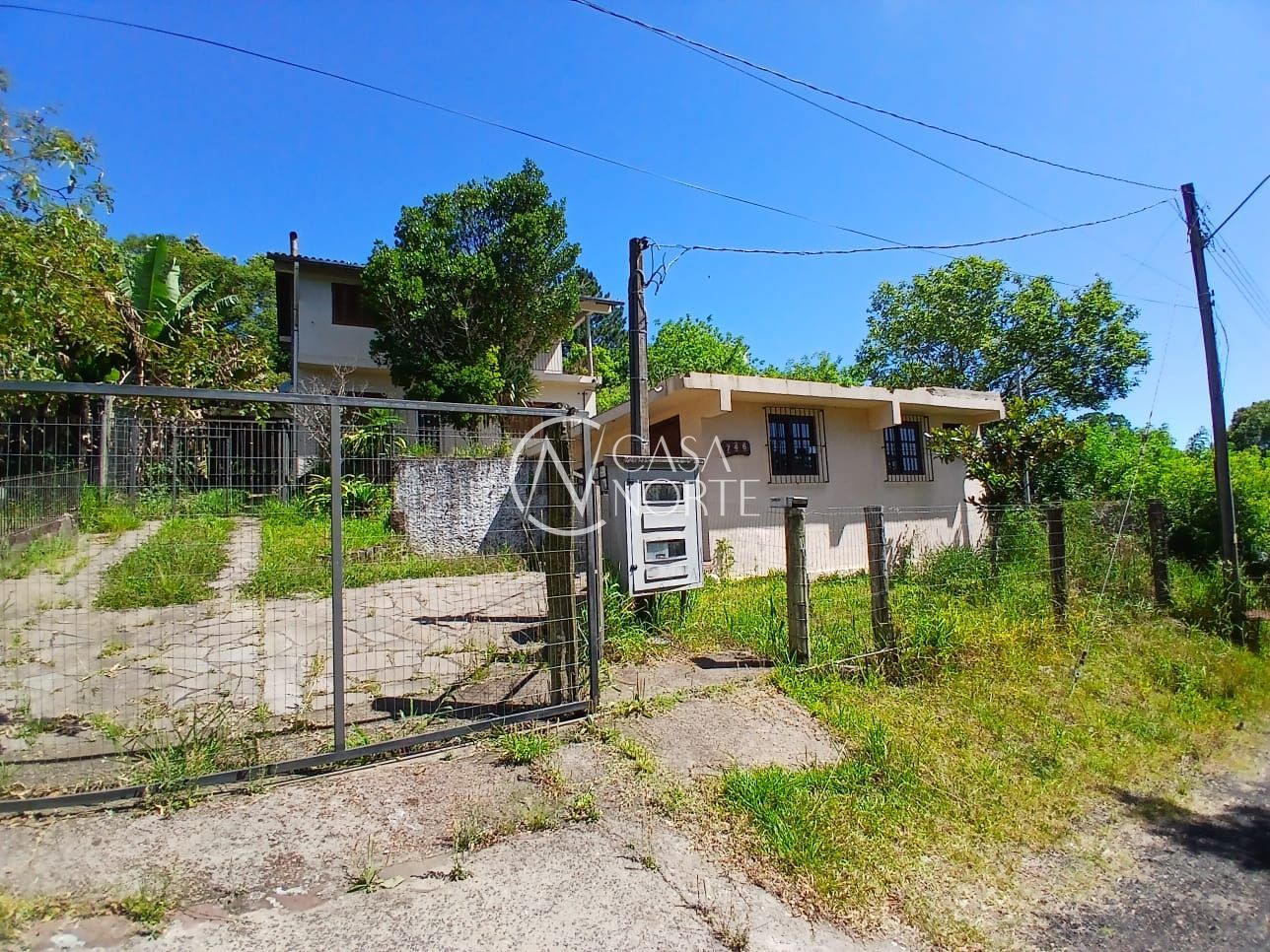 Casa à venda com 5 quartos, 300m², 4 vagas, Estrada das Furnas no bairro Vila Nova em Porto Alegre
