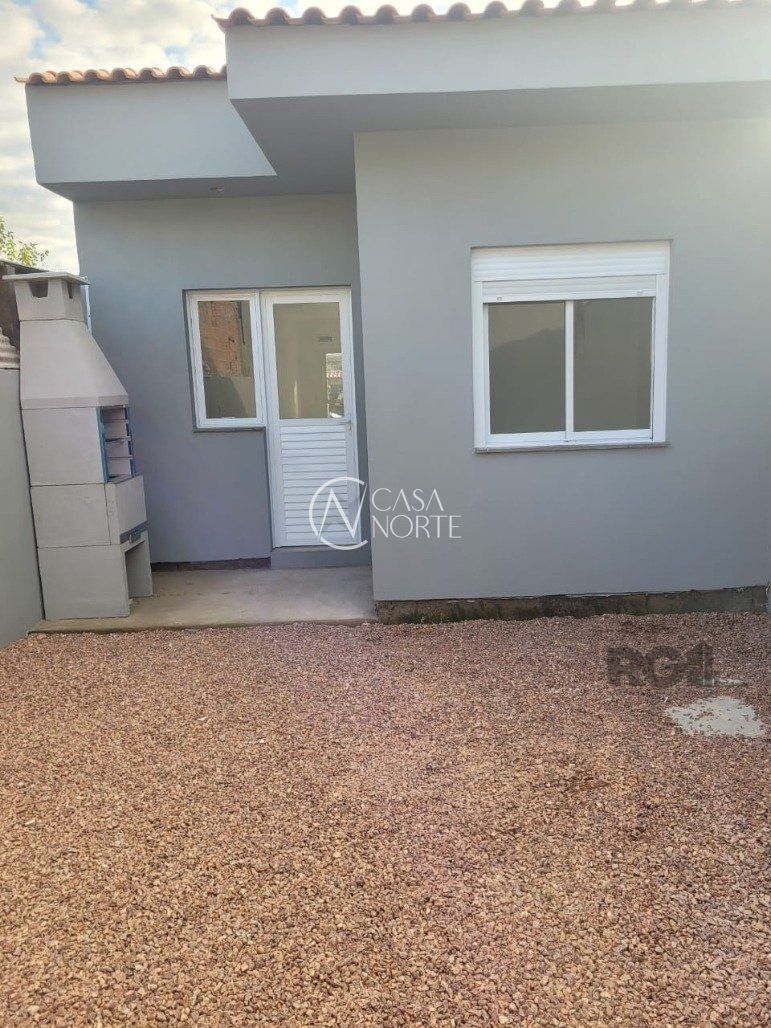 Casa à venda com 3 quartos, 63m², 1 suíte, 2 vagas, Rua Hesiodo Andrade no bairro Hípica em Porto Alegre