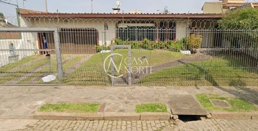 Casa à venda com 4 quartos, 464m², 2 suítes, 2 vagas, Rua Jacipuia no bairro Guarujá em Porto Alegre
