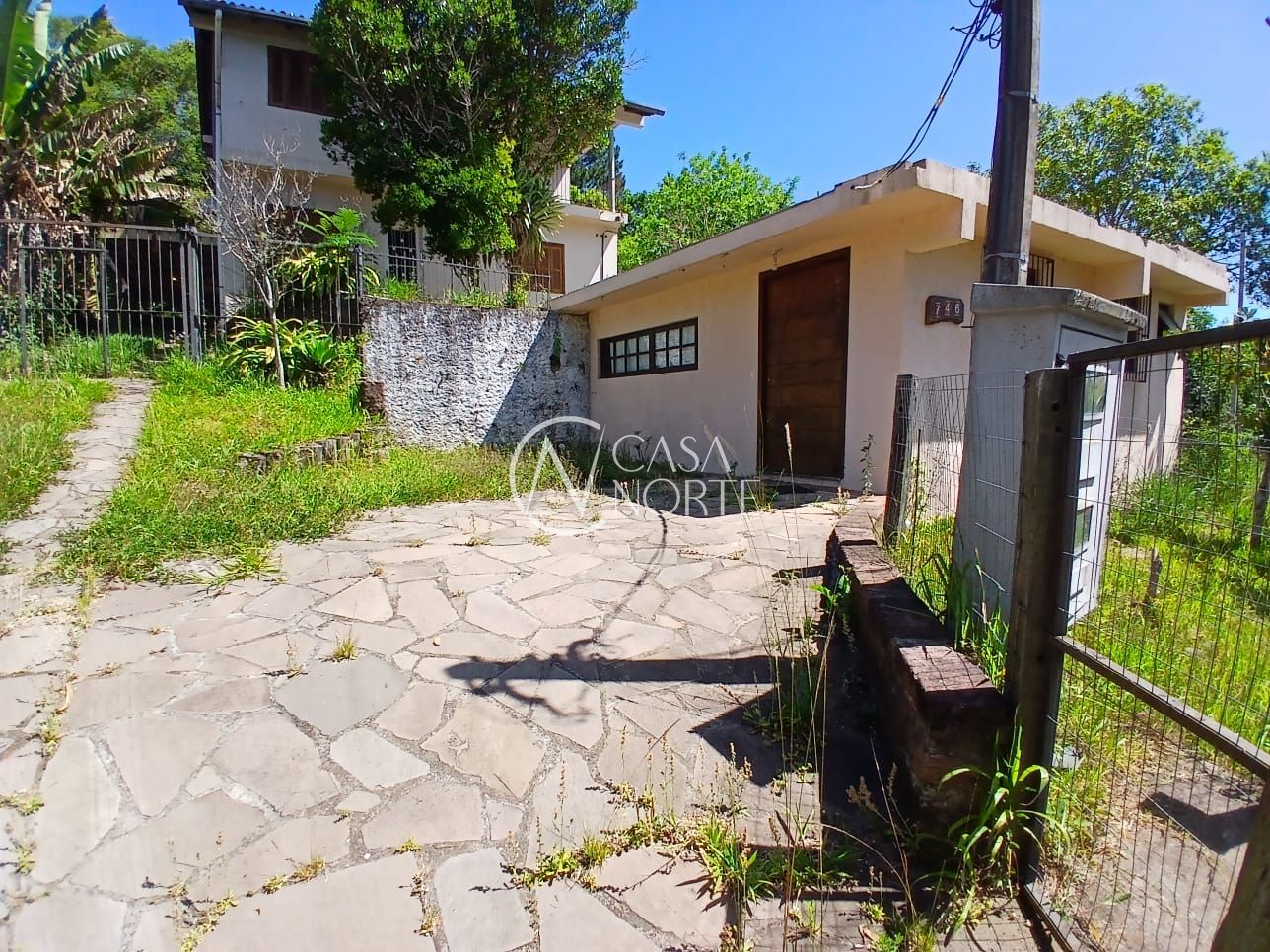 Casa à venda com 5 quartos, 300m², 4 vagas, Estrada das Furnas no bairro Vila Nova em Porto Alegre
