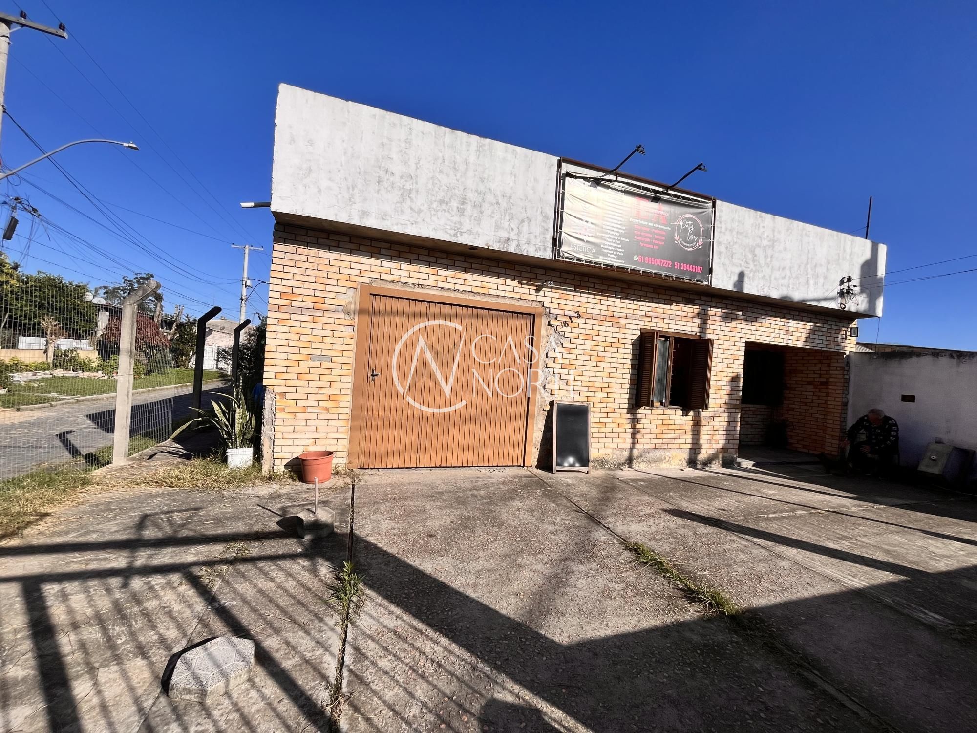 Casa à venda com 3 quartos, 143m², 2 vagas, Avenida Ignês E. Fagundes no bairro Restinga em Porto Alegre