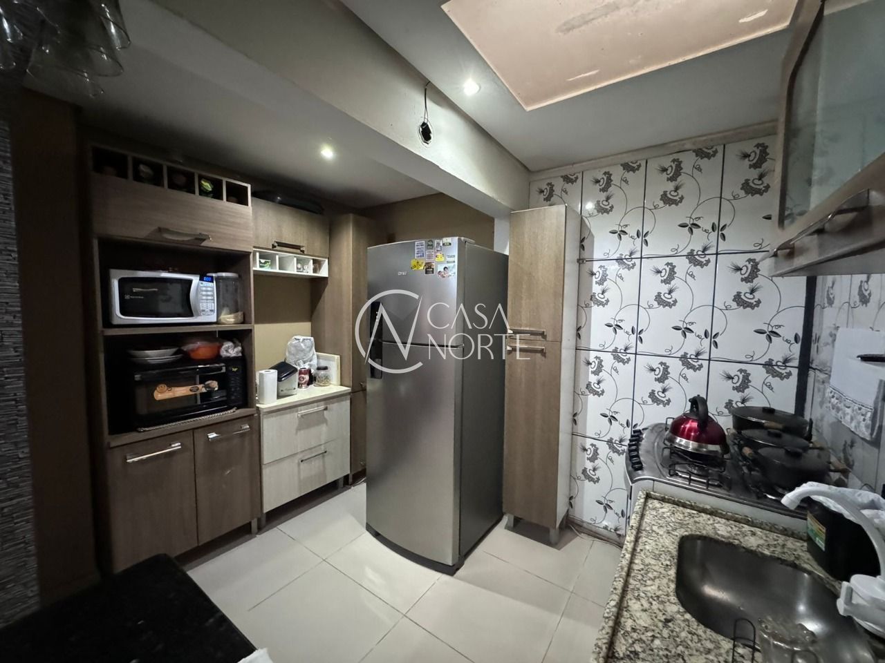 Casa à venda com 4 quartos, 170m², 1 suíte, 2 vagas, Rua Conrado Alvares no bairro Hípica em Porto Alegre