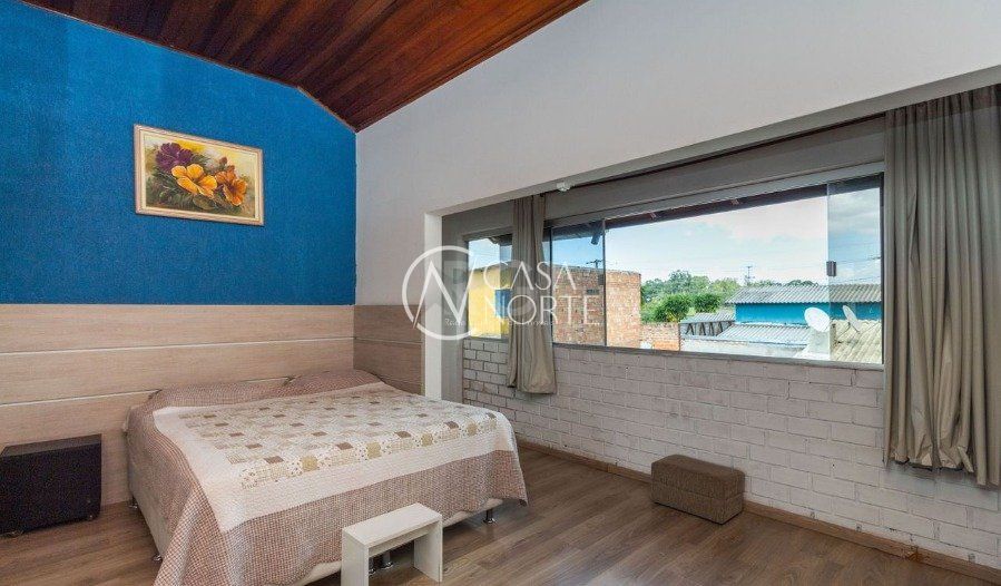 Casa à venda com 2 quartos, 136m², 2 vagas, Rua Álamo-Branco no bairro Restinga em Porto Alegre