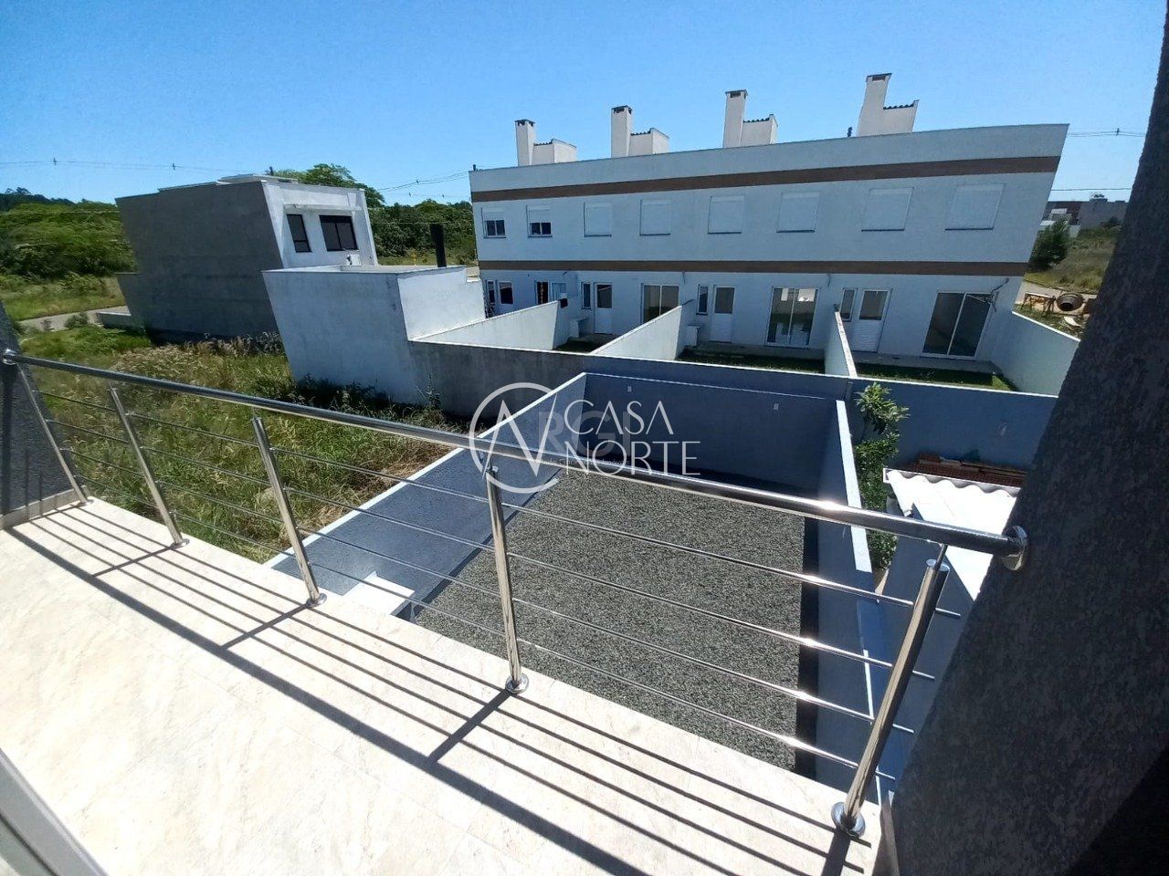 Sobrado à venda com 3 quartos, 102m², 1 suíte, 2 vagas, Rua Marco Túlio Kalil Ferreyro no bairro Aberta dos Morros em Porto Alegre