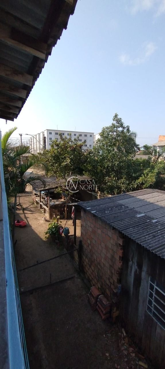 Casa à venda com 5 quartos, 100m², 1 vaga, Rua Sete Mil e Quatro no bairro Restinga em Porto Alegre