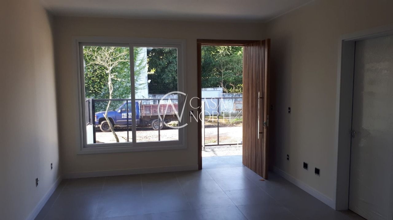 Casa à venda com 3 quartos, 69m², 1 suíte, 2 vagas, Rua Criciúma no bairro Guarujá em Porto Alegre