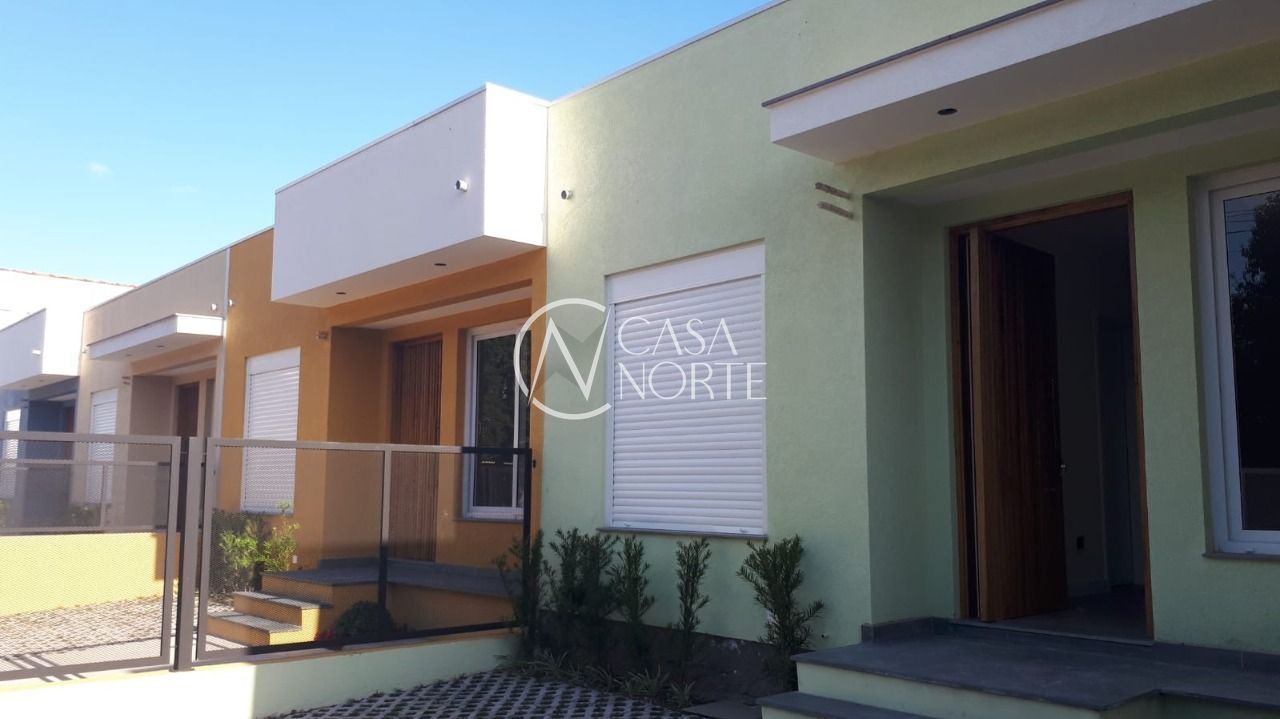 Casa à venda com 3 quartos, 69m², 1 suíte, 2 vagas, Rua Criciúma no bairro Guarujá em Porto Alegre