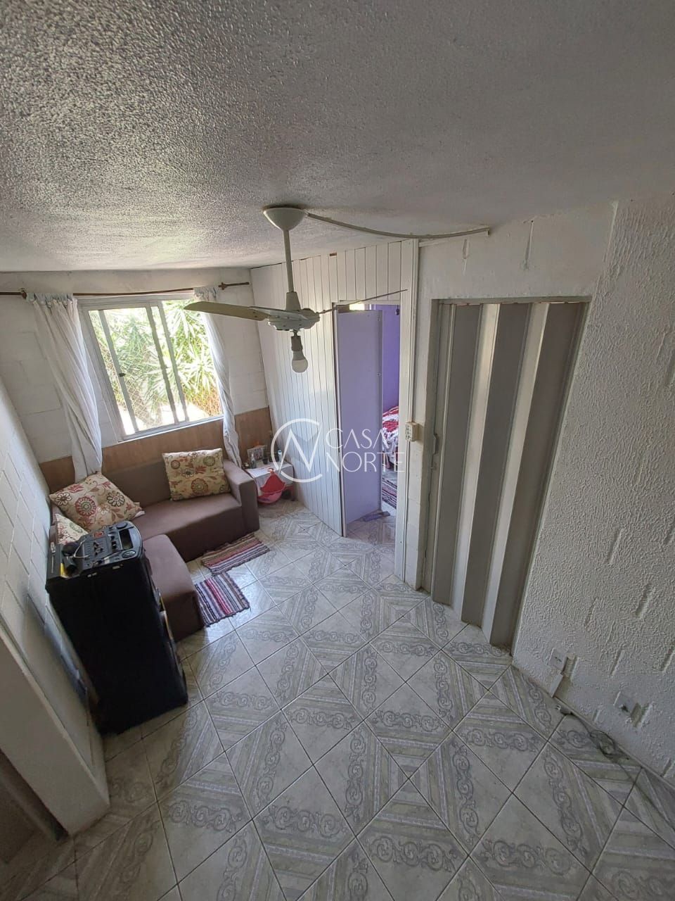 Apartamento à venda com 2 quartos, 36m², 1 vaga, Rua Atílio Supertti no bairro Vila Nova em Porto Alegre