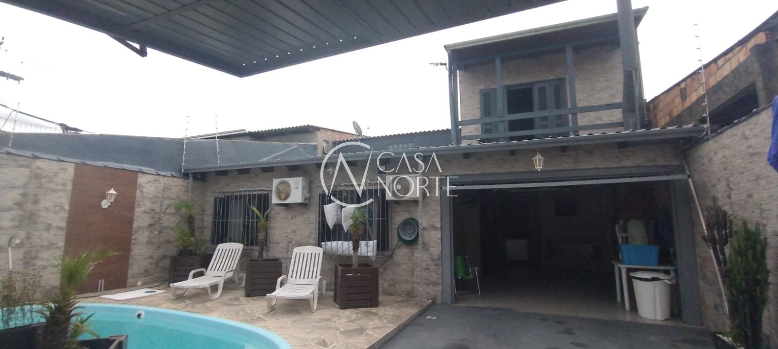 Casa à venda com 4 quartos, 80m², 2 vagas, Rua Clara Nunes no bairro Restinga em Porto Alegre