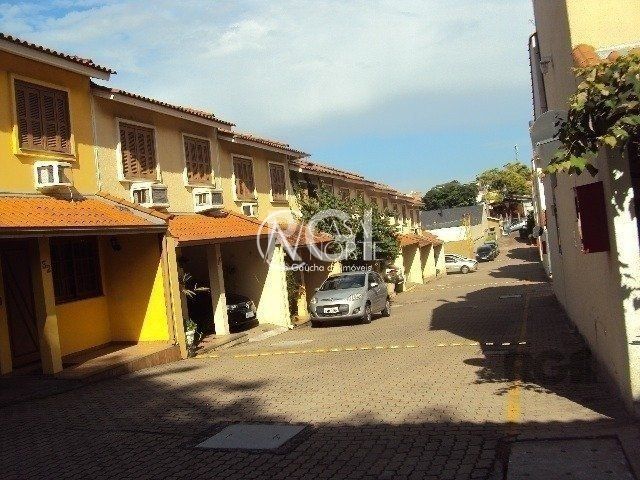 Casa de Condomínio à venda com 3 quartos, 95m², 1 vaga, Rua Humberto de Campos no bairro Partenon em Porto Alegre