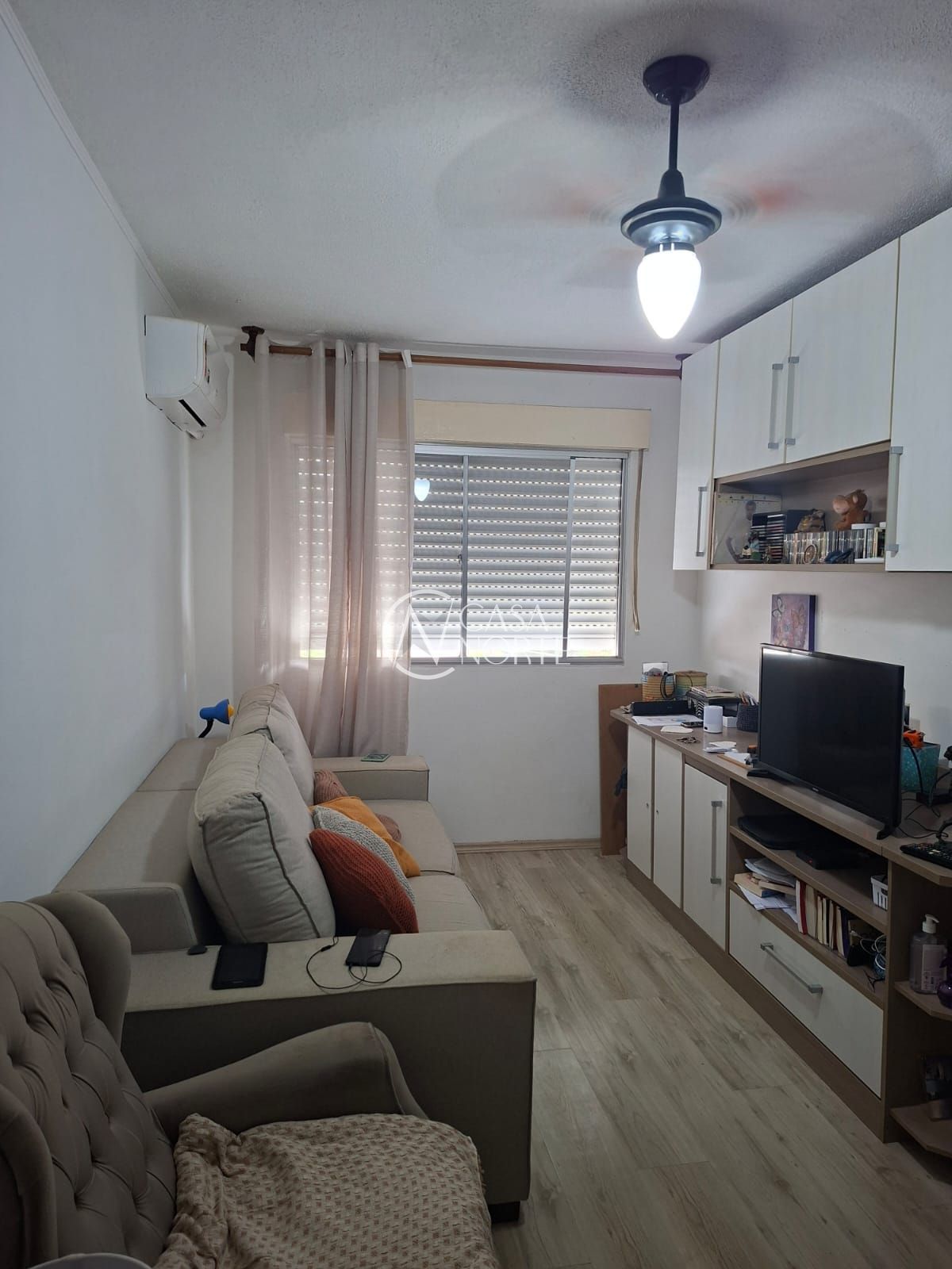 Apartamento à venda com 2 quartos, 55m², 1 vaga, Rua Moyses Antunes da Cunha no bairro Santo Antônio em Porto Alegre