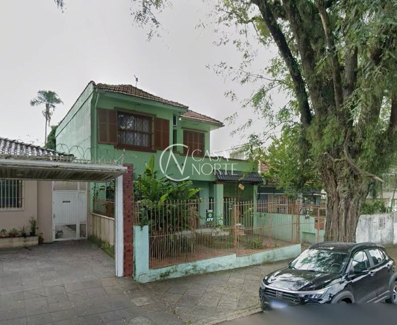 Casa à venda com 5 quartos, 253m², 2 vagas, Rua Tobias Barreto no bairro Partenon em Porto Alegre