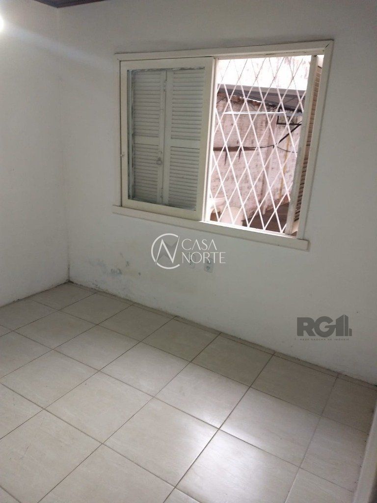 Terreno Comercial à venda com 1 quarto com 217m², 10 vagas, Travessa Azevedo no bairro Floresta em Porto Alegre