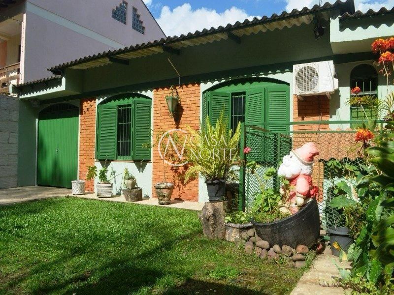 Casa à venda com 4 quartos, 250m², 1 suíte, 4 vagas, Rua Doutora Maria Augusta Generoso Estrela no bairro Parque Santa Fé em Porto Alegre