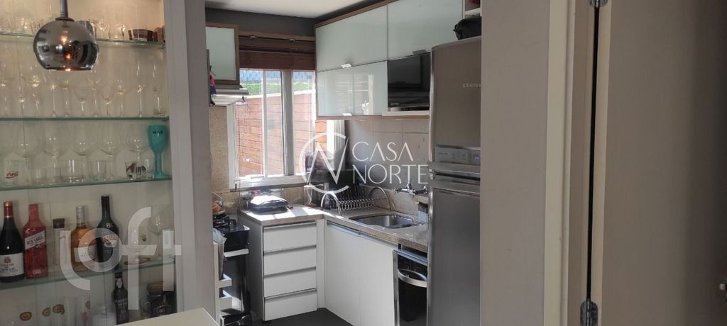 Casa de Condomínio à venda com 3 quartos, 322m², 1 suíte, 2 vagas, Rua Adão Gregory no bairro Mário Quintana em Porto Alegre