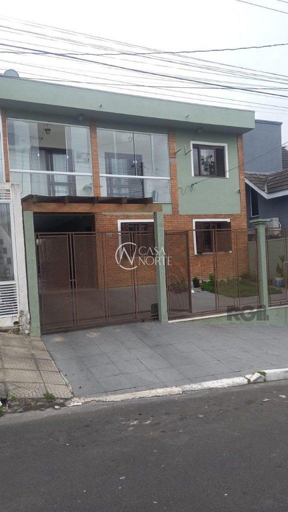 Casa à venda com 3 quartos, 368m², 1 suíte, 3 vagas, Rua Madre Celina Maria Azambuja no bairro Mário Quintana em Porto Alegre