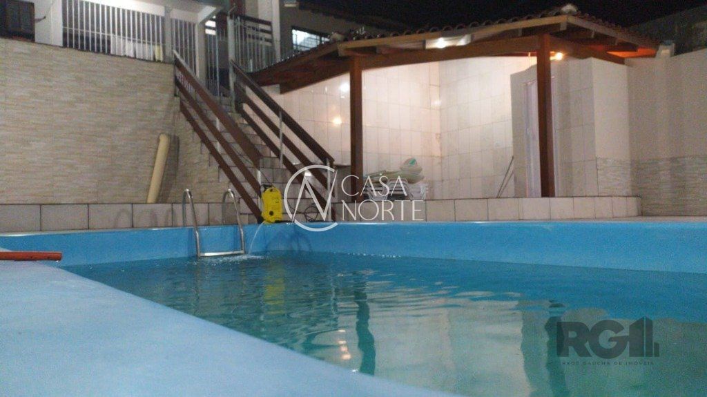 Casa à venda com 3 quartos, 245m², 1 suíte, 2 vagas, Paul Harris no bairro Jardim Itu em Porto Alegre