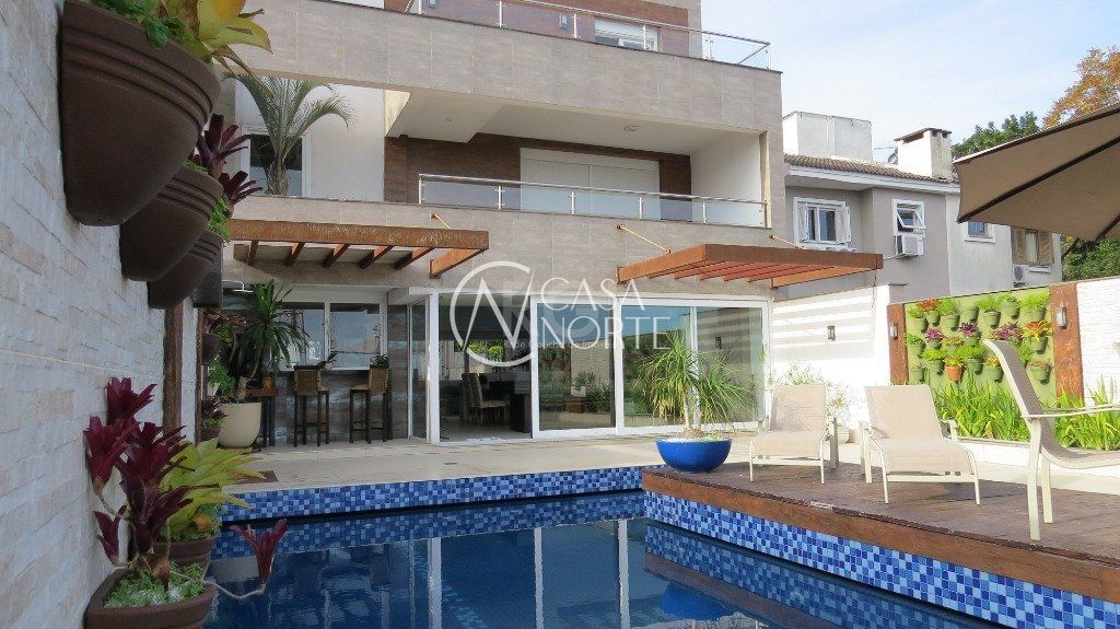 Casa à venda com 4 quartos, 427m², 4 suítes, 4 vagas, Rua Conselheiro Xavier da Costa no bairro Ipanema em Porto Alegre