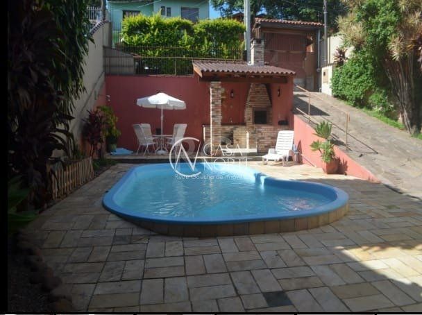 Casa à venda com 3 quartos, 100m², 1 suíte, 2 vagas, Rua Francisca Lechner no bairro Parque Santa Fé em Porto Alegre