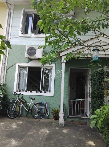Casa de Condomínio à venda com 2 quartos, 76m², 1 vaga, Rua Engenheiro Frederico Dahne no bairro Sarandi em Porto Alegre