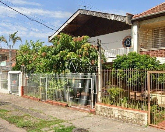 Casa à venda com 5 quartos, 398m², 3 vagas, Rua Adão Baino no bairro Cristo Redentor em Porto Alegre