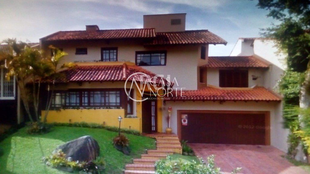 Casa à venda com 4 quartos, 334m², 1 suíte, 4 vagas, Rua Rodonel Guatimozim no bairro Ipanema em Porto Alegre