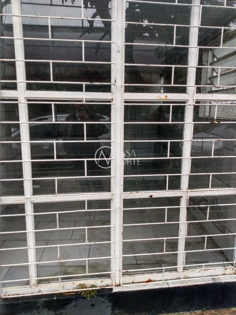 Casa à venda com 4 quartos, 293m², 1 suíte, 3 vagas, Rua Delegado Grant no bairro Santana em Porto Alegre