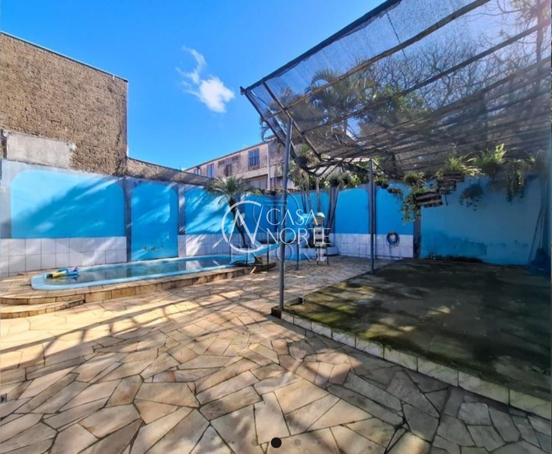 Casa à venda com 3 quartos, 113m², 2 vagas, Rua Ângelo Dourado no bairro Anchieta em Porto Alegre