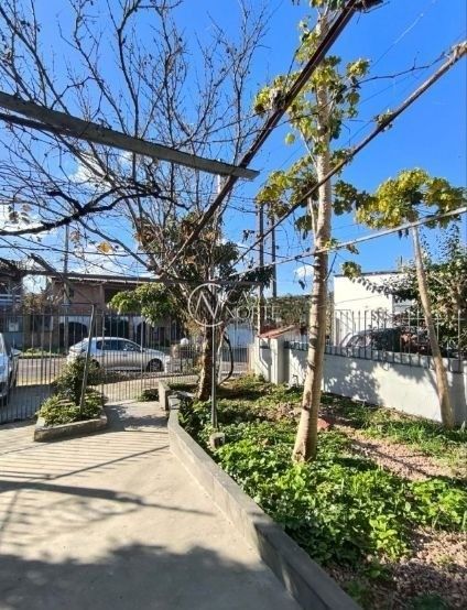 Casa à venda com 3 quartos, 121m², 2 vagas, Rua Palestina no bairro Jardim do Salso em Porto Alegre