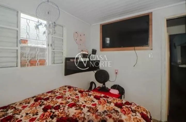 Casa à venda com 2 quartos, 55m², 1 vaga, Rua Carumbé no bairro Bom Jesus em Porto Alegre