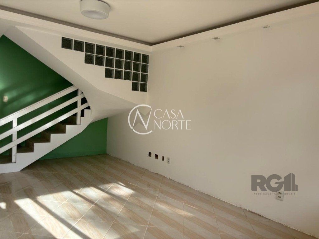 Casa de Condomínio à venda com 3 quartos, 207m², 2 vagas, Avenida Orleaes no bairro Guarujá em Porto Alegre