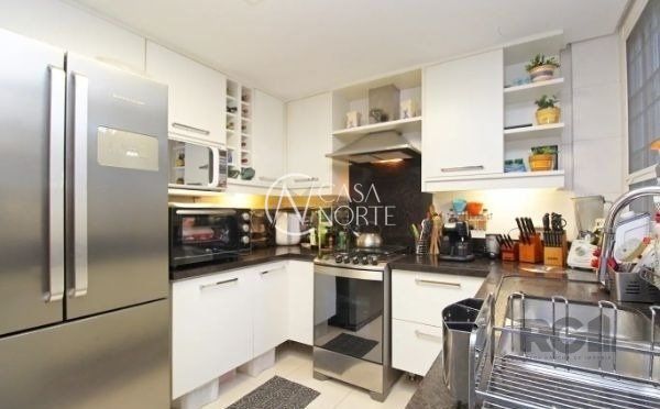 Casa de Condomínio à venda com 3 quartos, 284m², 3 suítes, 3 vagas, Rua São Leopoldo no bairro Vila Jardim em Porto Alegre