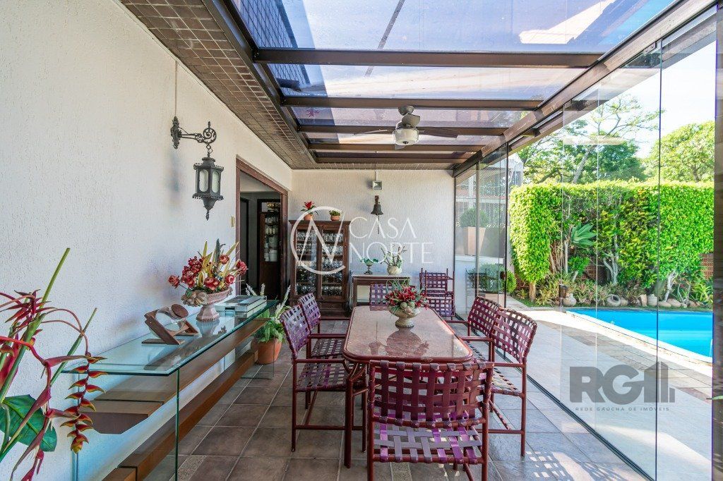 Casa de Condomínio à venda com 3 quartos, 230m², 1 suíte, 2 vagas, Rua Sinke no bairro Santa Tereza em Porto Alegre