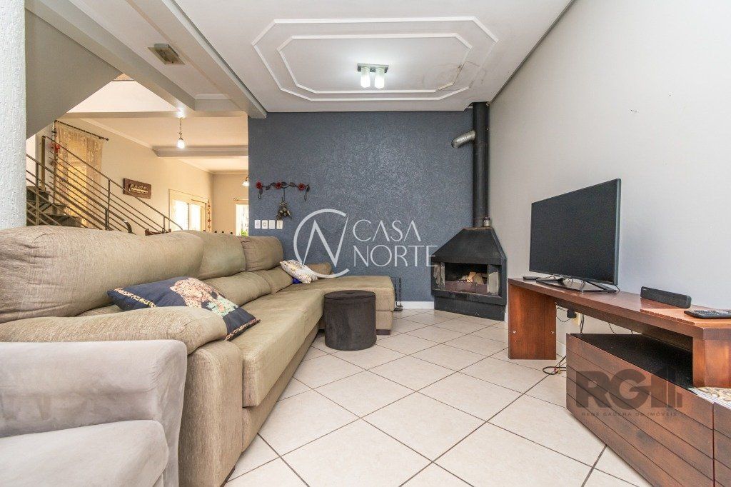 Casa à venda com 5 quartos, 380m², 4 suítes, 4 vagas, Rua Isidoro Trêssi no bairro Jardim Botânico em Porto Alegre