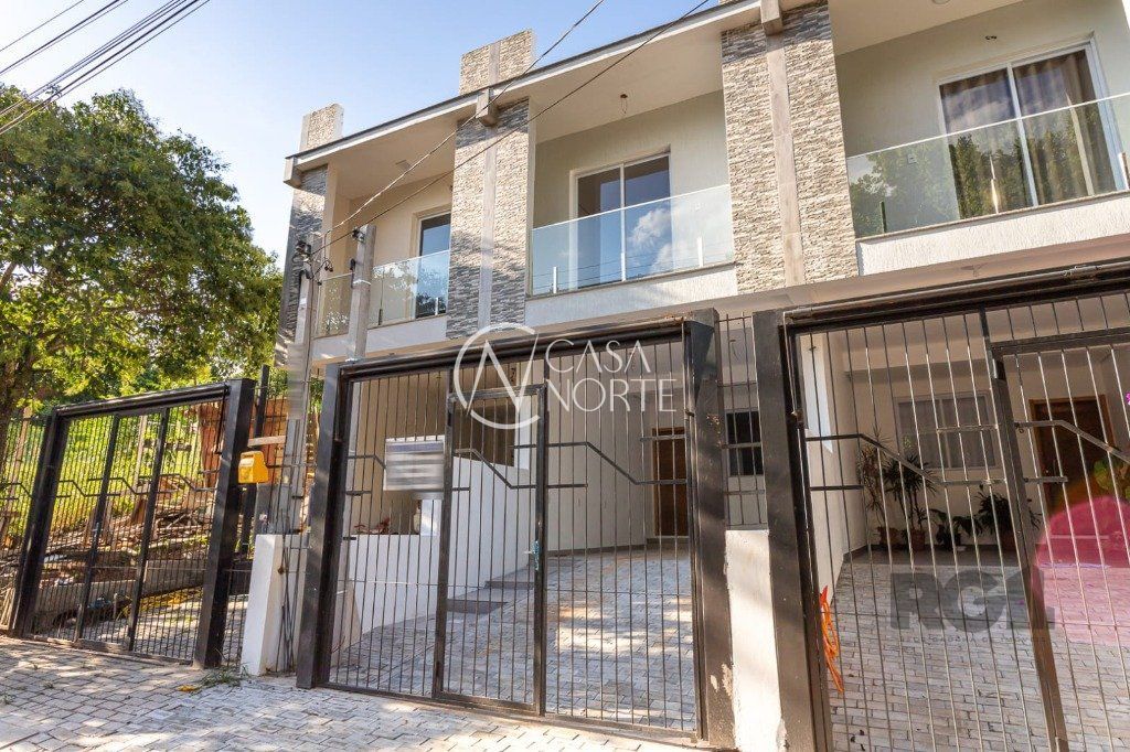 Casa à venda com 3 quartos, 140m², 1 suíte, 2 vagas, Rua Abdo Jorge Curi no bairro Parque Santa Fé em Porto Alegre