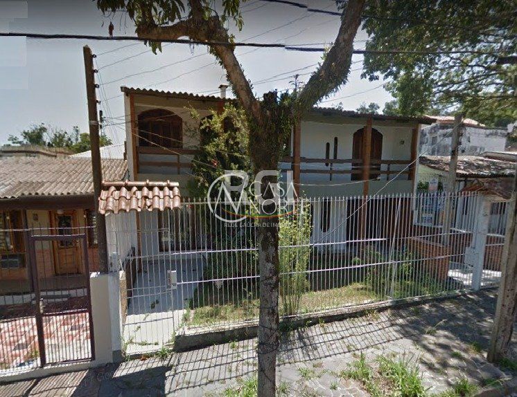 Casa à venda com 4 quartos, 300m², 4 vagas, Rua Mathilde Zatar no bairro Nonoai em Porto Alegre