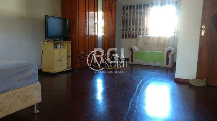 Casa à venda com 4 quartos, 300m², 4 vagas, Rua Mathilde Zatar no bairro Nonoai em Porto Alegre