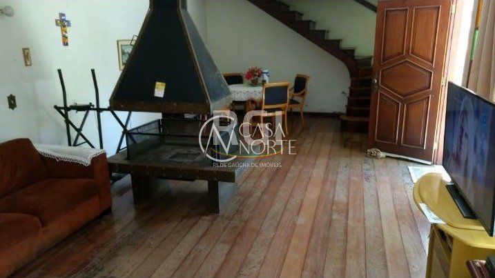 Casa à venda com 4 quartos, 300m², 4 vagas, Rua Mathilde Zatar no bairro Nonoai em Porto Alegre