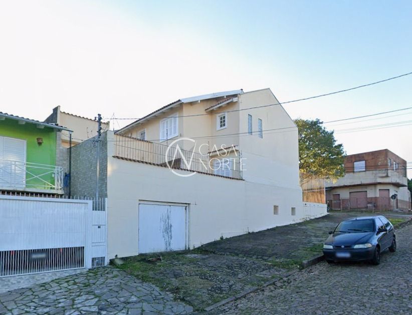 Casa à venda com 4 quartos, 315m², 3 suítes, 2 vagas, Rua Caldre e Fião no bairro Santo Antônio em Porto Alegre