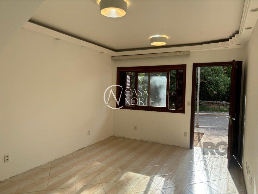 Casa de Condomínio à venda com 3 quartos, 207m², 2 vagas, Avenida Orleaes no bairro Guarujá em Porto Alegre