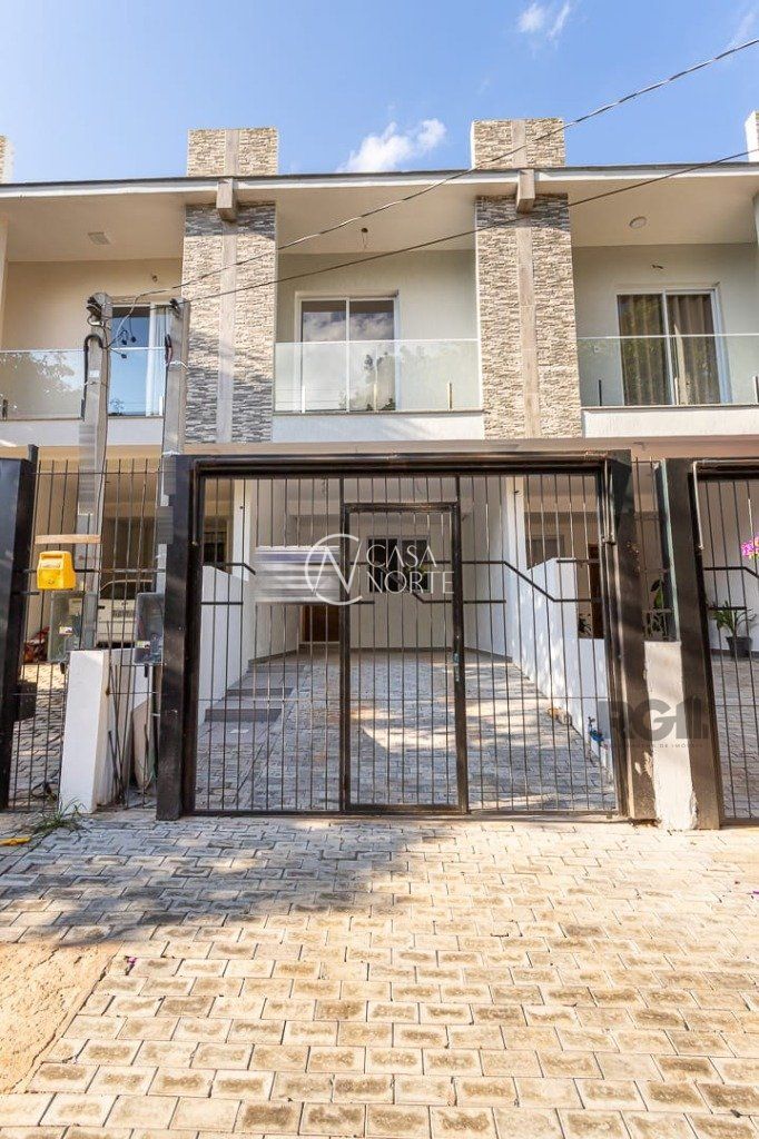 Casa à venda com 3 quartos, 140m², 1 suíte, 2 vagas, Rua Abdo Jorge Curi no bairro Parque Santa Fé em Porto Alegre