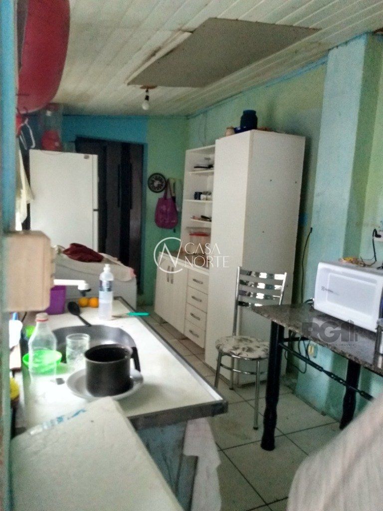 Casa à venda com 4 quartos, 293m², 1 suíte, 3 vagas, Rua Delegado Grant no bairro Santana em Porto Alegre