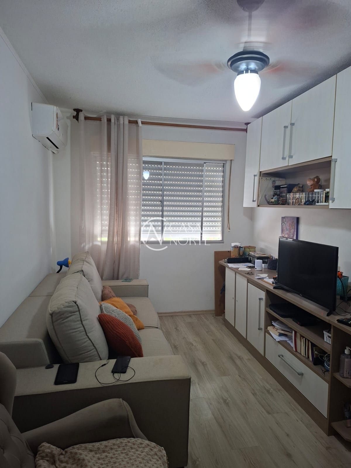 Apartamento à venda com 2 quartos, 55m², 1 vaga, Rua Moyses Antunes da Cunha no bairro Santo Antônio em Porto Alegre