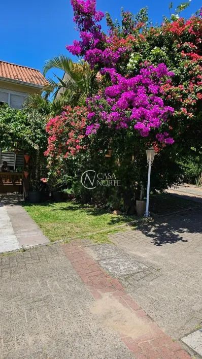 Casa de Condomínio à venda com 3 quartos, 196m², 1 suíte, 4 vagas, Rua Adão Gregory no bairro Mário Quintana em Porto Alegre