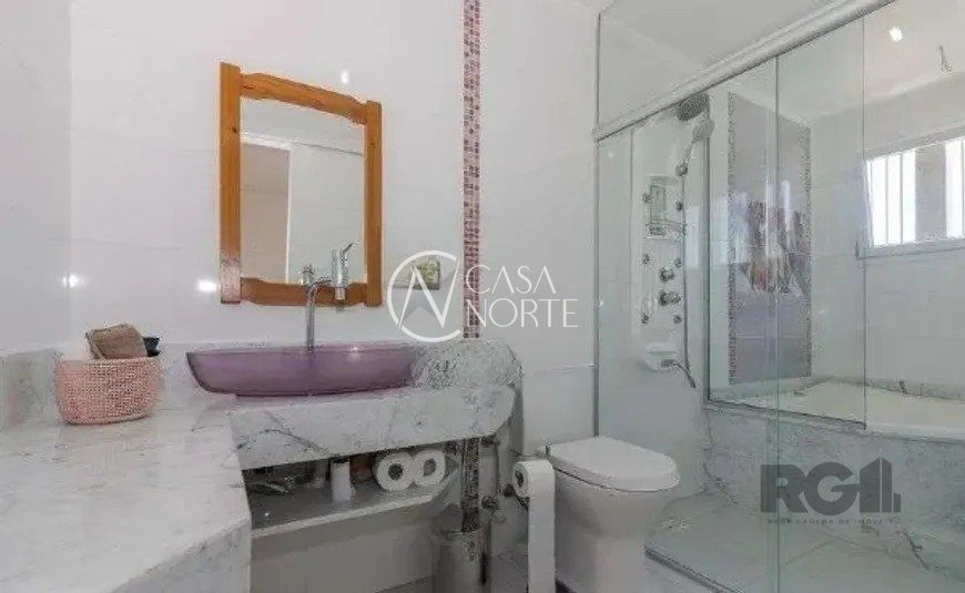 Casa à venda com 4 quartos, 395m², 3 suítes, 3 vagas, Rua Arnaldo Ballve no bairro Jardim Itu em Porto Alegre