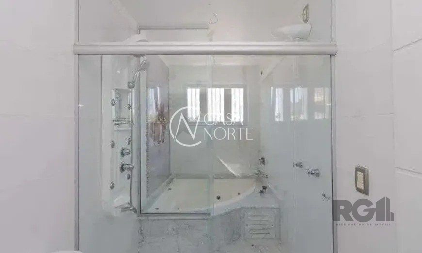 Casa à venda com 4 quartos, 395m², 3 suítes, 3 vagas, Rua Arnaldo Ballve no bairro Jardim Itu em Porto Alegre