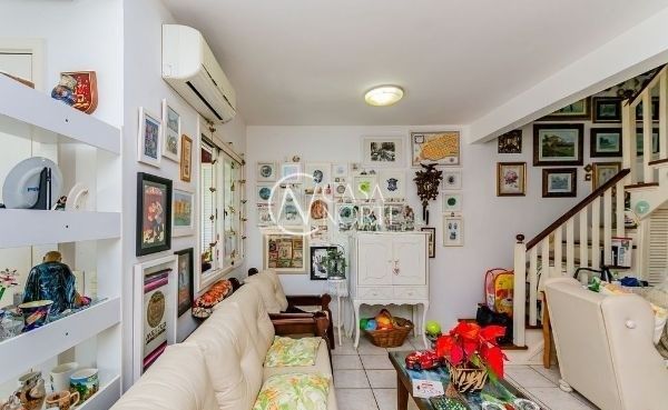 Casa de Condomínio à venda com 3 quartos, 148m², 1 suíte, 2 vagas, Estrada João Salomoni no bairro Vila Nova em Porto Alegre