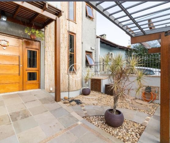 Casa à venda com 3 quartos, 141m², 2 suítes, 1 vaga, Rua Romano Rolando Botin no bairro Hípica em Porto Alegre